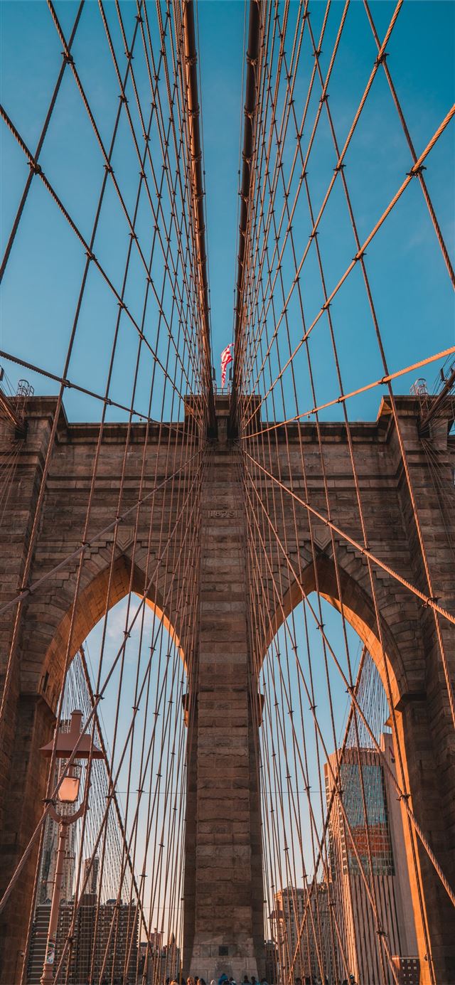 low angle photo of Brooklyn Bridge iPhone 11 wallpaper 