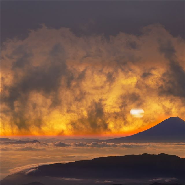 volcano mountains sky fantasy orange clouds sunset... iPad Air wallpaper 